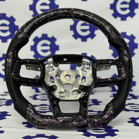 2024+ Ford Mustang Forged Carbon Fiber Steering Wheel + Pink Flakes - Preset