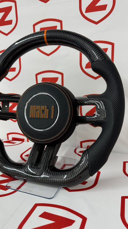 Volante de fibra de carbono Mach 1 Mustang 2015-2023 (naranja) - Preestablecido